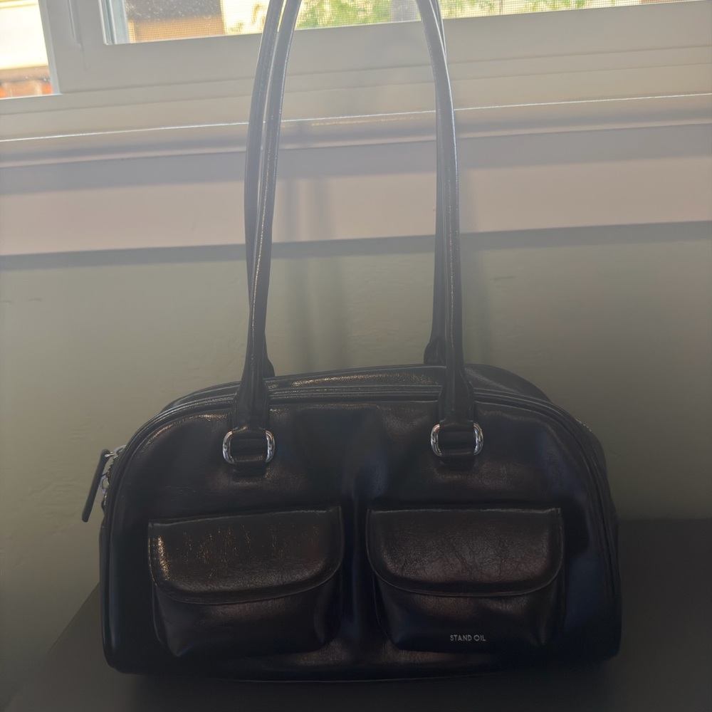 STAND OIL chubby bag in black